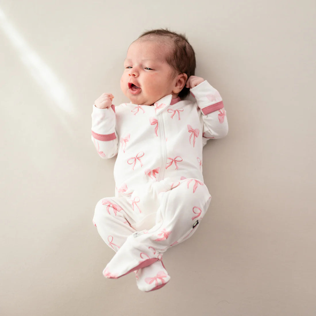 Kyte Zipper Footie - Bows