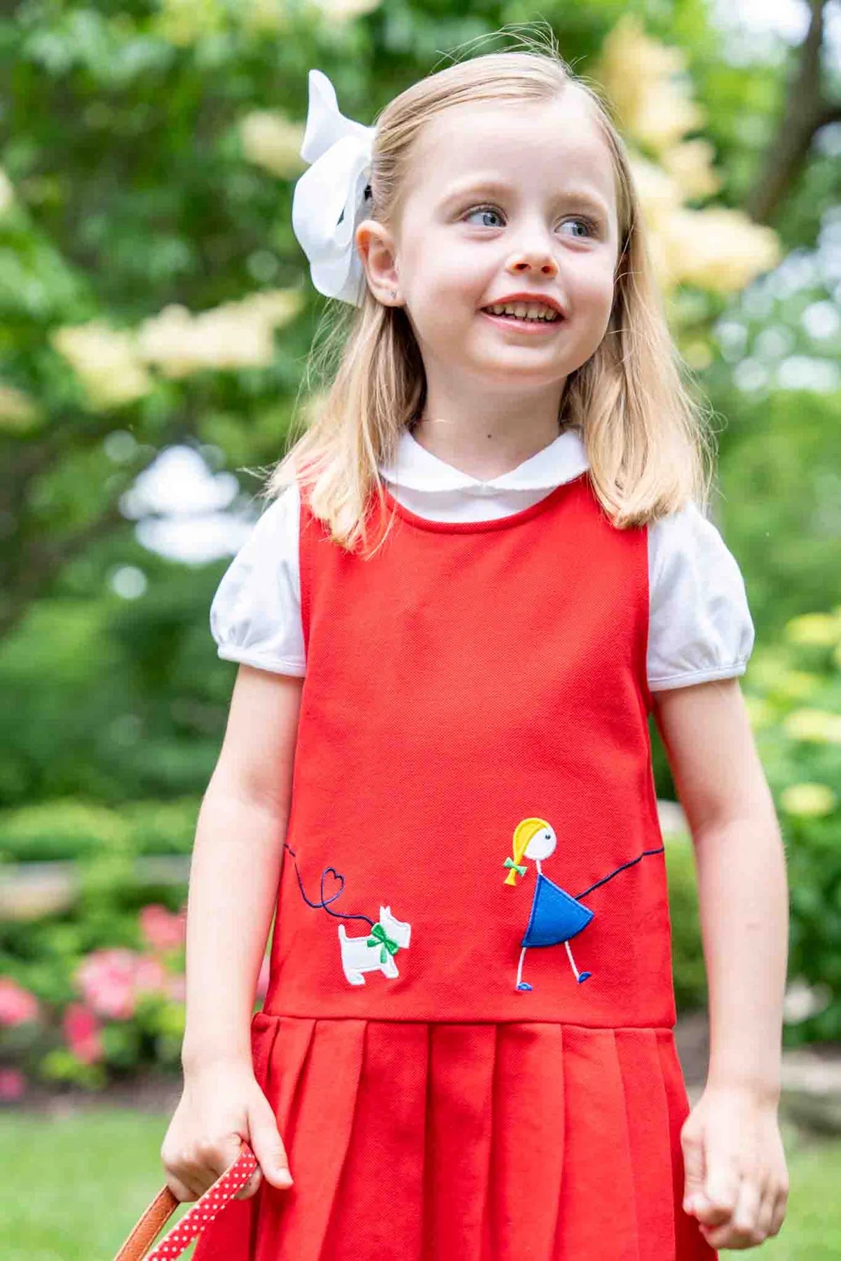 Red Pique Pleated Jumper - Girl Walking Dog